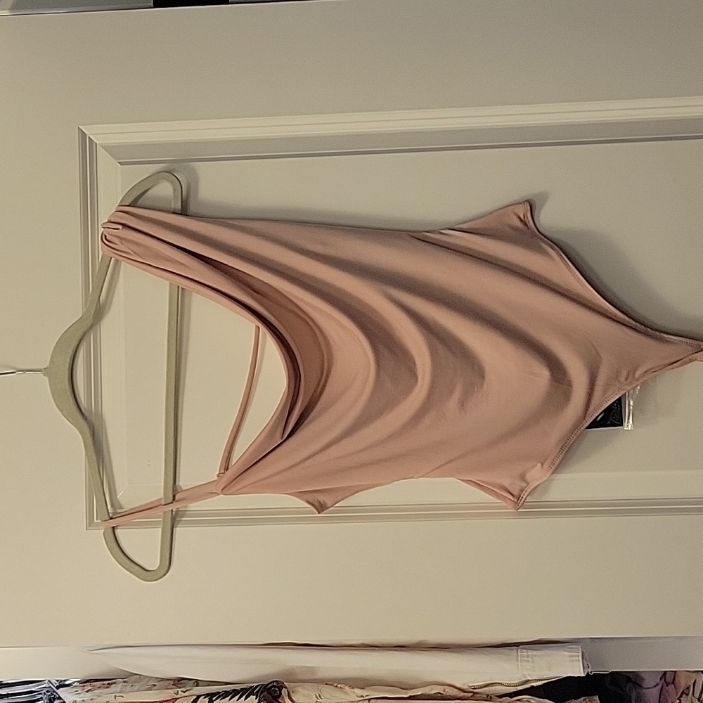 NWT Le Lis blush pink asymmetrical strappy open back bodysuit.